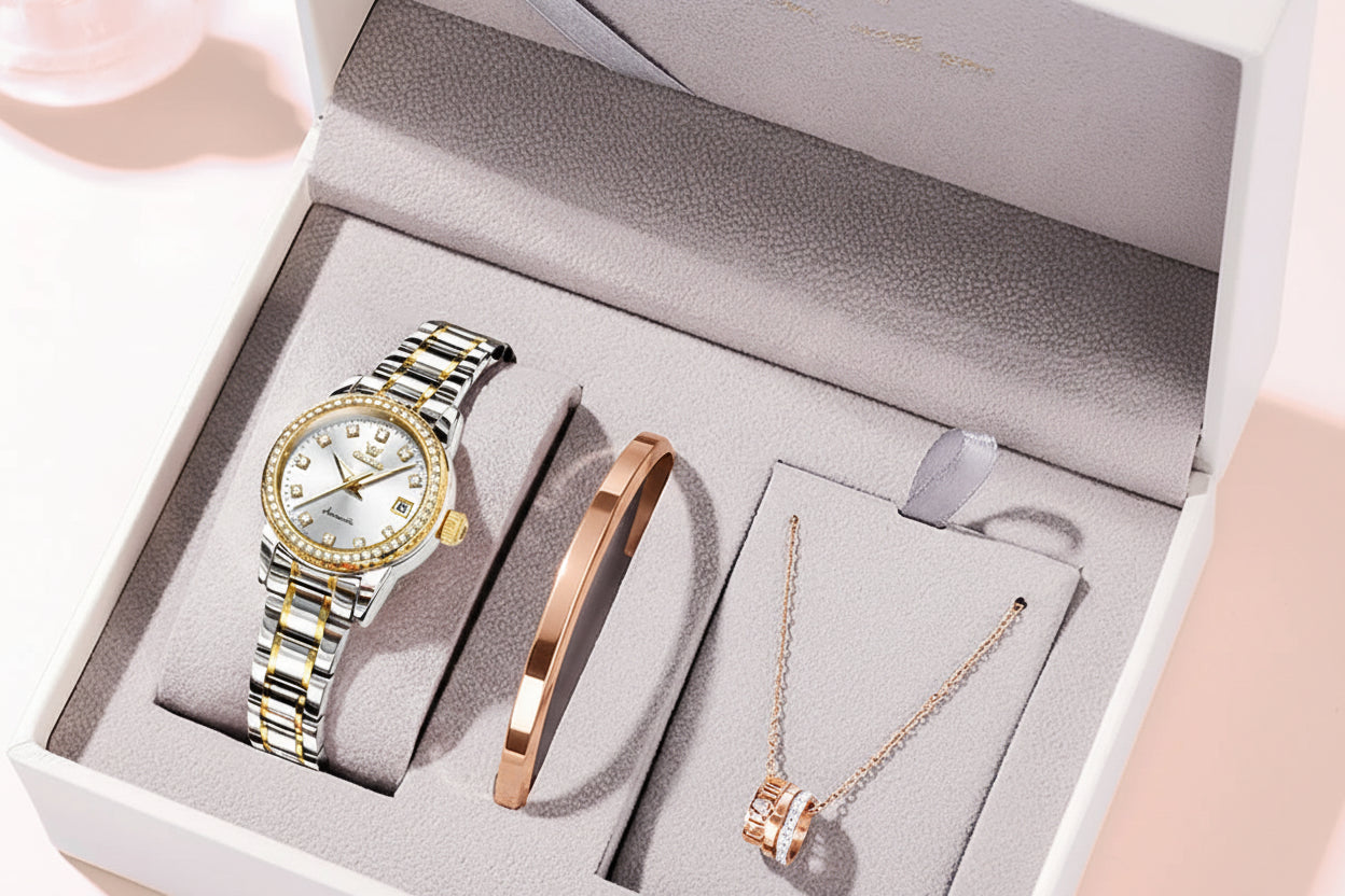 Jewelry set with watch, bracelet, and necklace in a box, featuring the OLEVS brand.