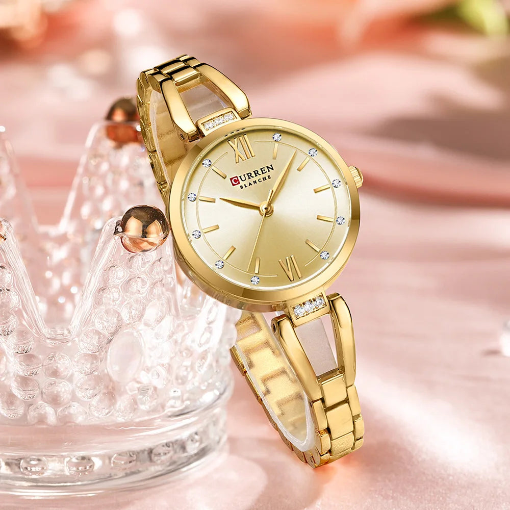 Gold wristwatch with decorative background