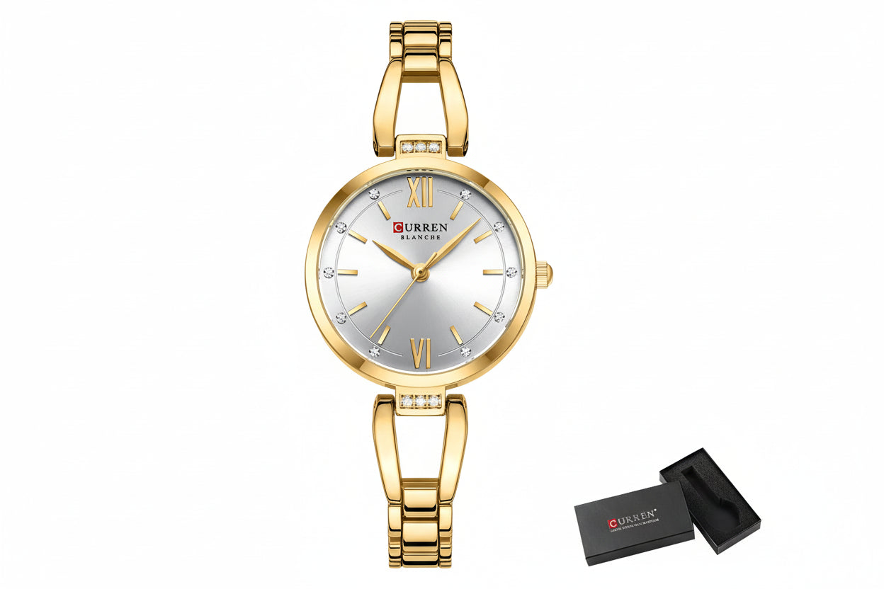 Gold Curren watch with silver face on a white background