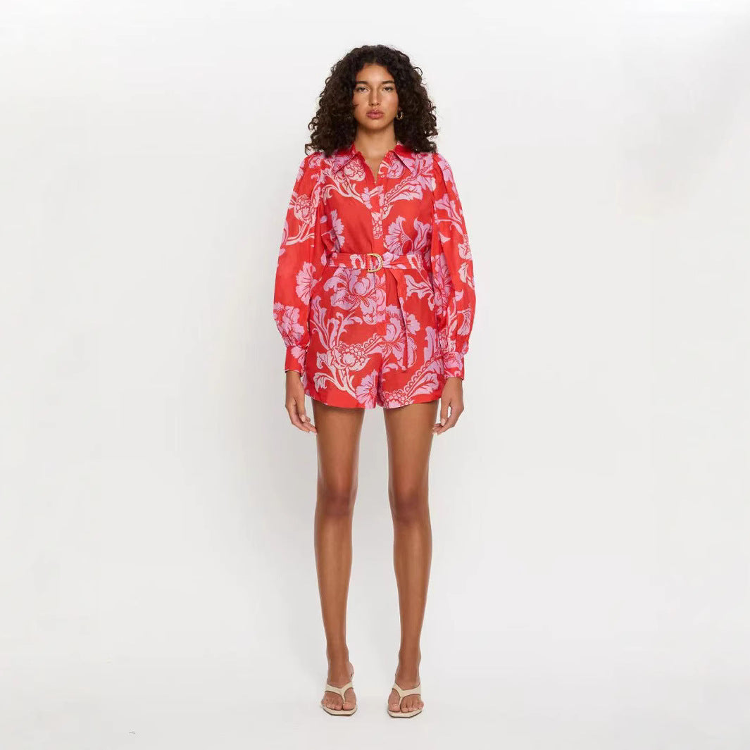 Woman wearing a red and white patterned outfit on a white background